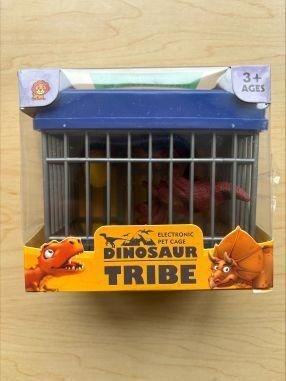 ABC Trading toy recall image showing dinosaur toy in gray and blue cage packaging