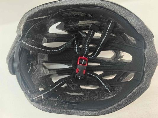 Interior view of recalled Favoto H-1 bicycle helmet showing strap and padding system