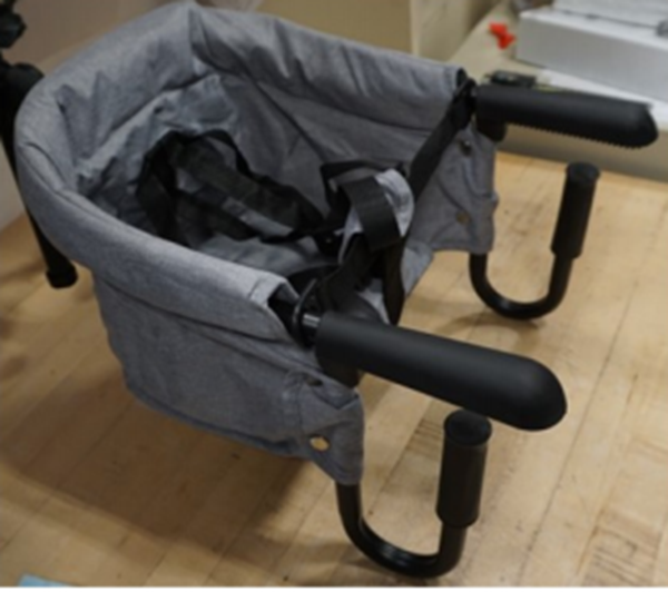 PandaEar portable hook-on chair recall showing gray hook-on baby chair with table attachment arms

